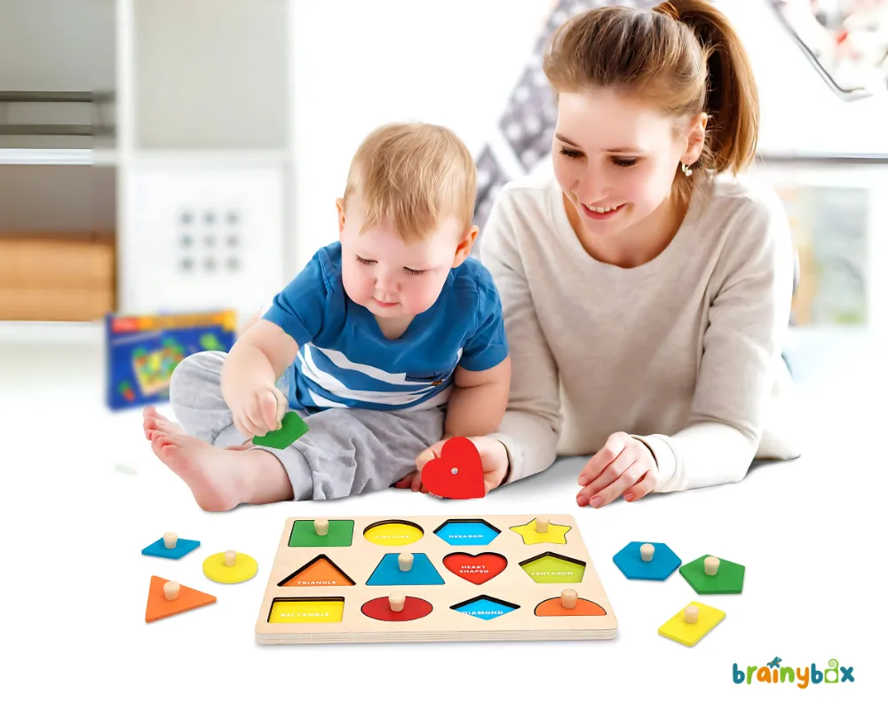 toddler-learning-shapes-with-parent-brainybox-শিশু-আকৃতি-শিখছে-বাবা-মায়ের-সাথে-ব্রেইনিবক্স.webp